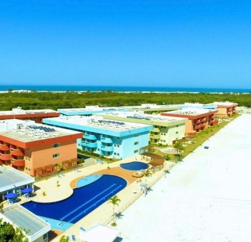 a rendering of a resort on the beach at Resort GoldenLake em Arraial do Cabo in Arraial do Cabo