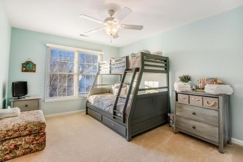 a bedroom with a bunk bed and a dresser at Bethany Lakes --- 31302 Terry Circle in Bethany Beach
