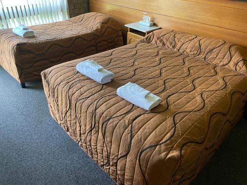 Pavlos Motelにあるベッド