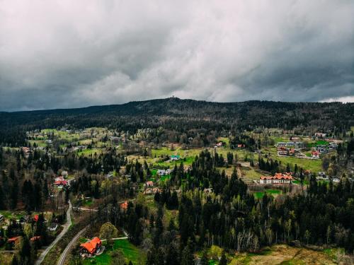 an aerial view of a town in a forest at Stacja Szklarska Poręba - cisza i komfort in Szklarska Poręba