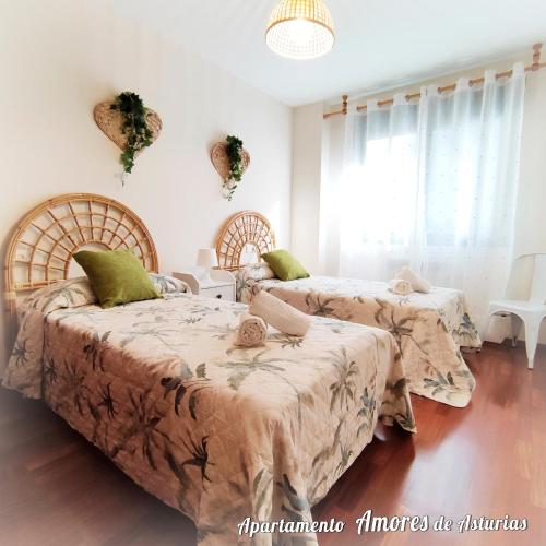 A bed or beds in a room at AMORES DE ASTURIAS