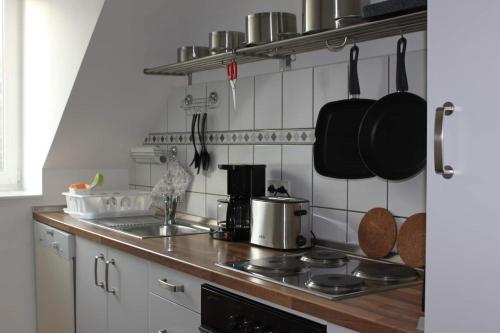 Kuchyň nebo kuchyňský kout v ubytování Ferienwohnung Hardtblick