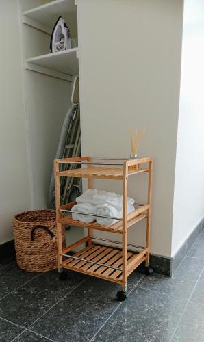 a shelf with towels on it in a room at The Empire Hotel Deloraine in Deloraine