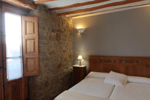 Postel nebo postele na pokoji v ubytování Casa Barría