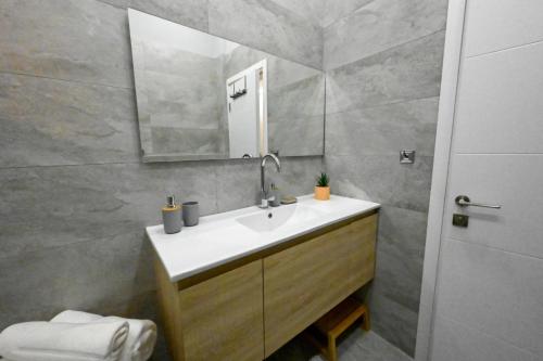 a bathroom with a sink and a mirror at Luxury Queen Mountian in Eilat