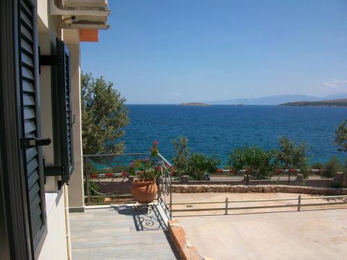 a view of the ocean from a balcony of a house at Niriides in Galaxidhion