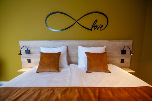 Letto o letti in una camera di Hotel Onder De Linden