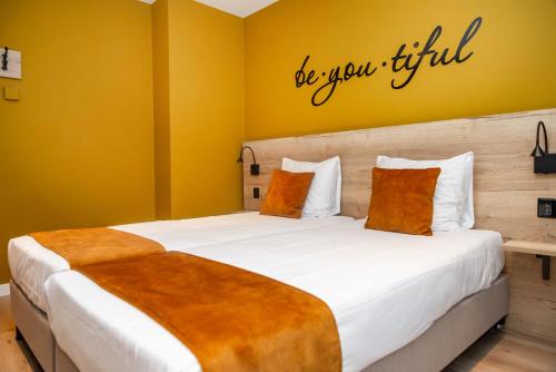 Letto o letti in una camera di Hotel Onder De Linden