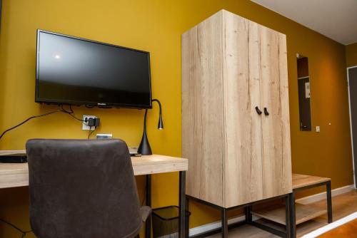 TV o dispositivi per l'intrattenimento presso Hotel Onder De Linden