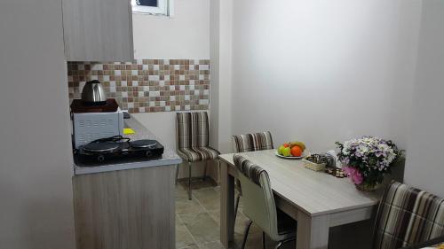 A kitchen or kitchenette at BeyazitHan Suites
