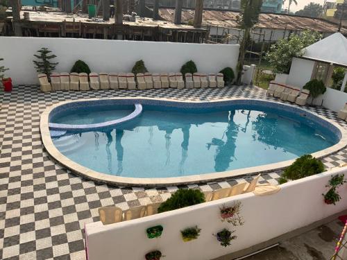 Vista de la piscina de Samriddhi Banquet Garden & Resorts o d'una piscina que hi ha a prop