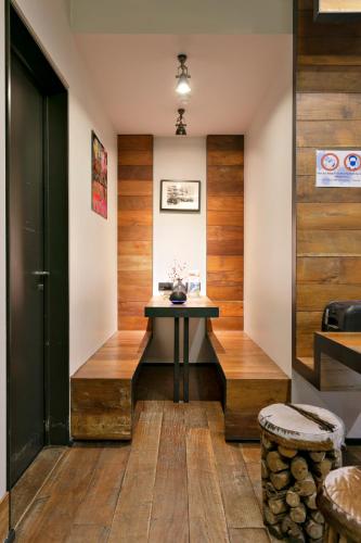 a desk in a room with wooden walls at Boutique Hotel Saint-Géry in Brussels