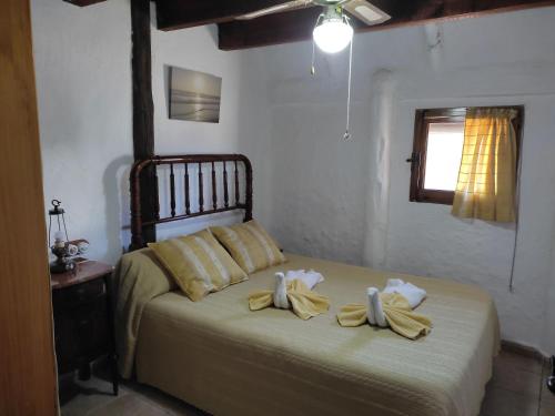 Un pat sau paturi într-o cameră la Barraca Gran