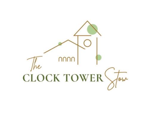 a logo for the clock tower story at The Clock Tower Stow in Stow on the Wold