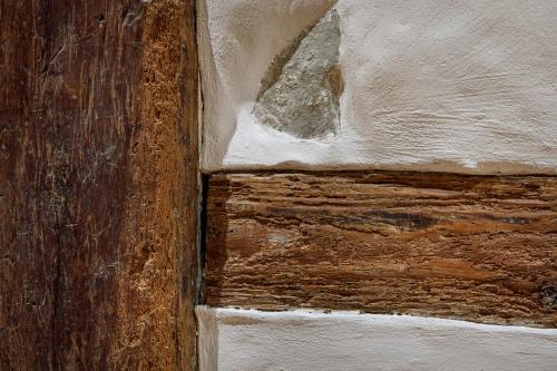 a close up of a piece of wood with a wall at La Colombe Boutique Hotel in Zug