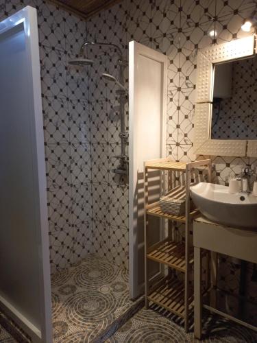 Kúpeľňa v ubytovaní Riad côté jardin