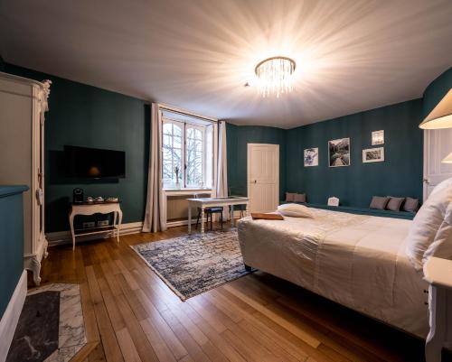 Hotel Ô Château tesisinde bir odada yatak veya yataklar
