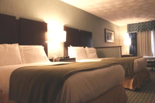 Ένα ή περισσότερα κρεβάτια σε δωμάτιο στο Holiday Inn Express & Suites Smithfield - Providence by IHG