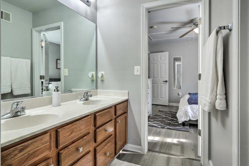 a bathroom with a sink and a mirror at Laurel Family Home with Updates and Easy Location! in Laurel