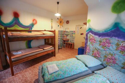 Postel nebo postele na pokoji v ubytování Hostel KlonDike