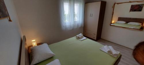Postel nebo postele na pokoji v ubytování Apartment Lara Pisak