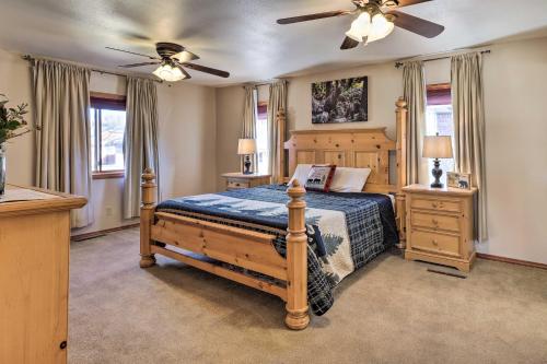 a bedroom with a bed and a ceiling fan at Welcoming Cañon City Abode - Walk to River! in Canon City