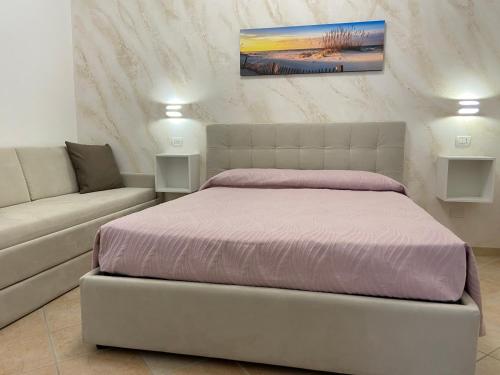 Postel nebo postele na pokoji v ubytování B&B Casa Denittis