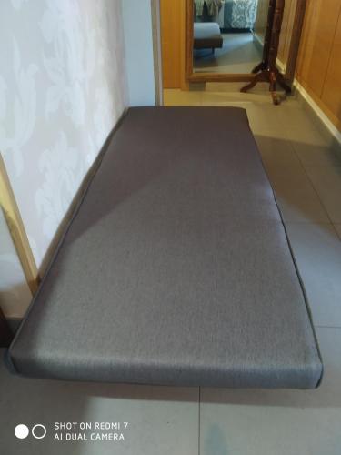 a mattress on a floor in a room at Habitacion Familiar en un Ático con gran terraza y,cocina ,en la playa in Burriana