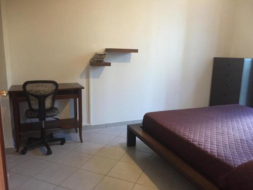 A bed or beds in a room at Sweet Maison