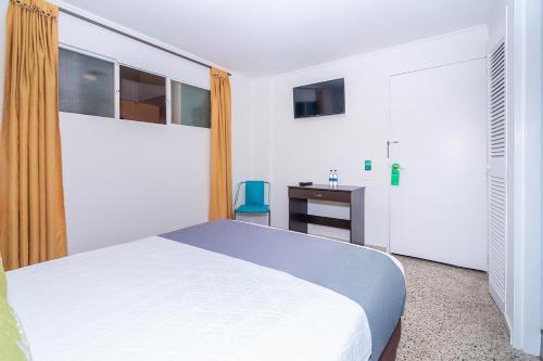 Hotel Oasisにあるベッド