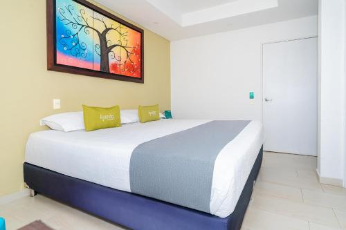 Hotel Oasisにあるベッド