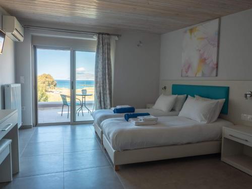 Posteľ alebo postele v izbe v ubytovaní Enali Villas