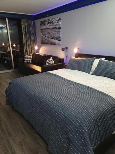 En eller flere senge i et værelse på Daytona Beach Resort #1219