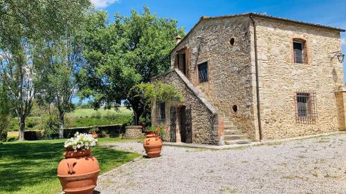 Een tuin van Podere La Chiusella B&B