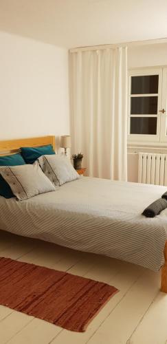 Postel nebo postele na pokoji v ubytování Kolbergarden
