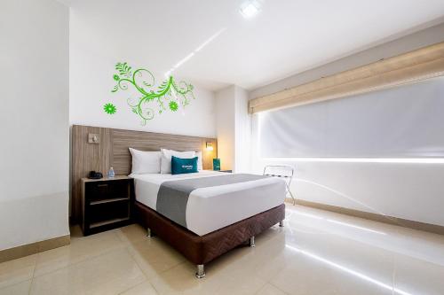 Katil atau katil-katil dalam bilik di Hotel MH Pereira