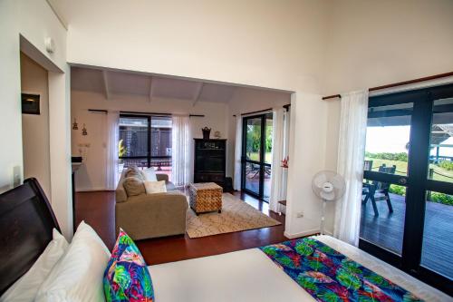 a living room with a view of a living room at Vai Villas in Avarua