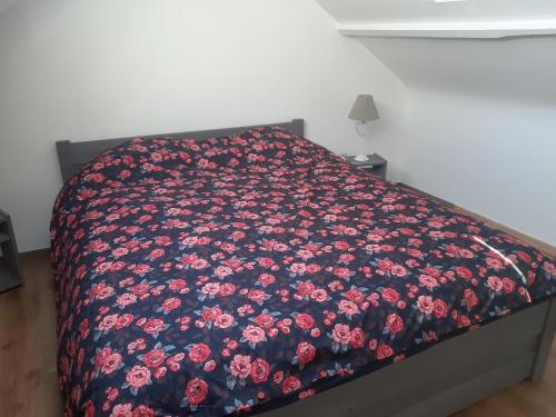 Postel nebo postele na pokoji v ubytování Gîte Le pt'i Baillis