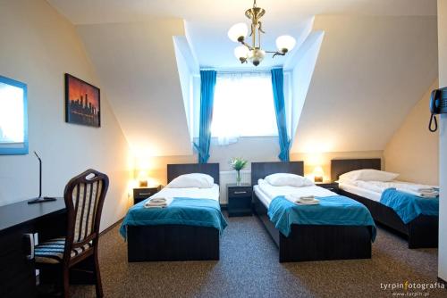Posteľ alebo postele v izbe v ubytovaní Hotel Millenium