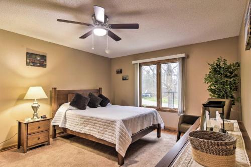 A bed or beds in a room at Serene Orchard Park Apartment Large Yard and Patio!