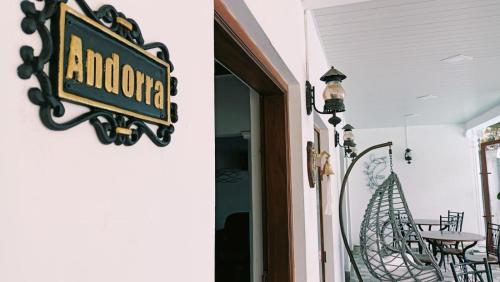 a sign on the door of a restaurant at Andorra Tourist Resort Anuradhapura in Anuradhapura