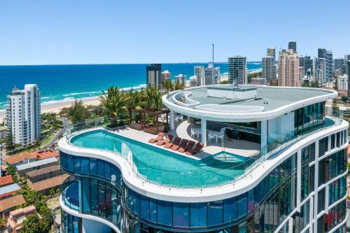 an image of a building with a pool and the beach at The Gallery Residences Broadbeach - Official Listing in Gold Coast
