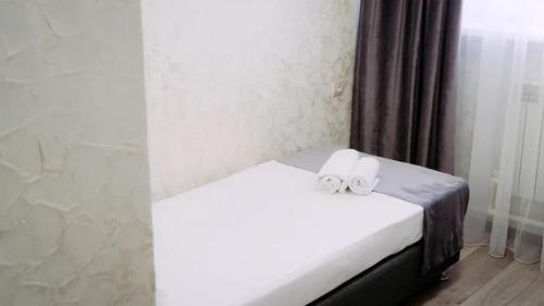 Postel nebo postele na pokoji v ubytování Rush Hotel