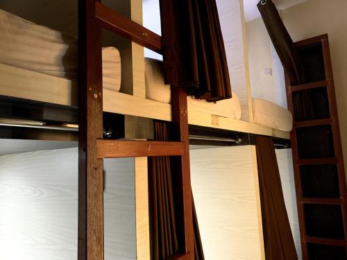 a pair of bunk beds in a room at Omah Pelem Syariah in Semarang