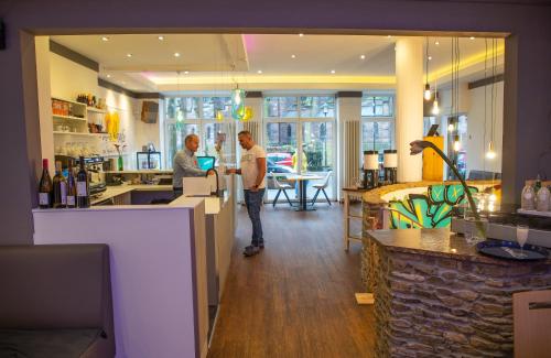 Un restaurante u otro lugar para comer en Hotel Madeleine Biohotel