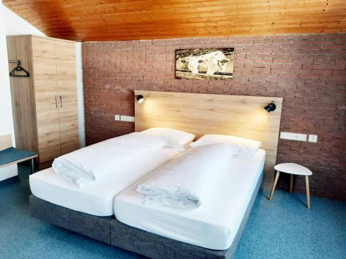 Säng eller sängar i ett rum på Weixler Schindelberg