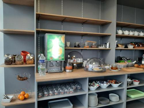 Η κουζίνα ή μικρή κουζίνα στο Cit'Hotel Talencia