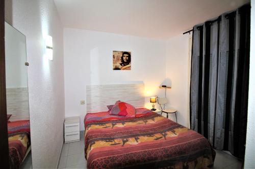 Posteľ alebo postele v izbe v ubytovaní Global Immo 2190 LAS MURALLAS