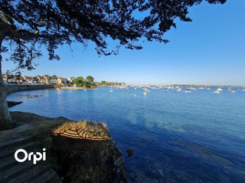 a view of a large body of water with boats at REF 146 Appartement pour quatre personnes jolie vue Port Crouesty ARZON in Arzon