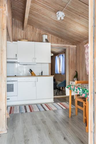 Kuchyň nebo kuchyňský kout v ubytování Hyttgårdens stugby i Huså, Åre kommun